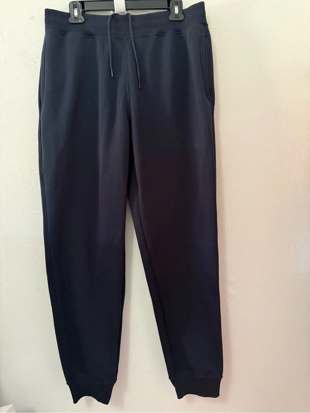 Navy blue UNIQLO Heattech pile lined sweatpants in size L. NWT